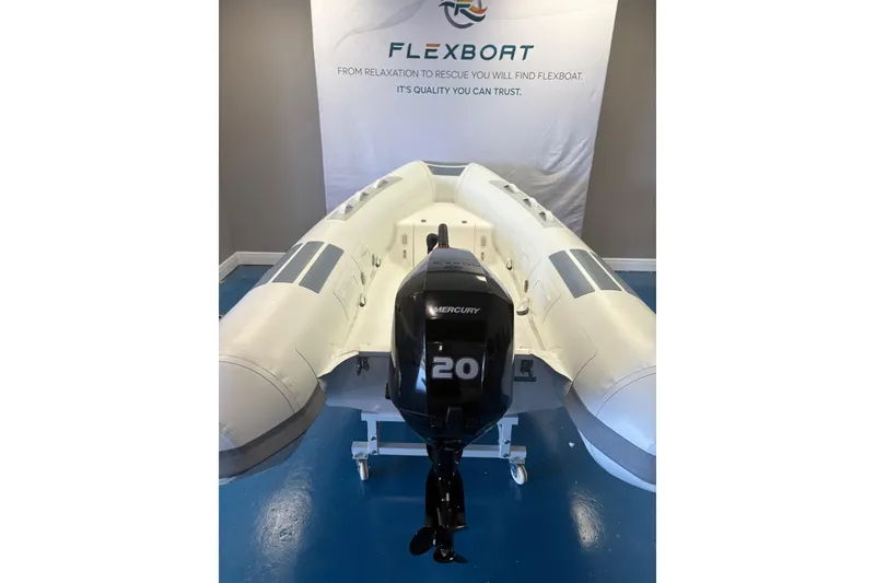 Slide: The Image of 2023 Flexboat Sr10 inflatable boat with Mercury 20 outboard motor in showroom. - 6
