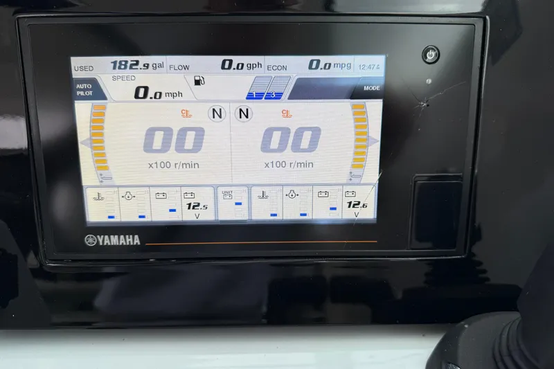 Slide: The Image of Yamaha display on 2023 Pursuit DC 326 Dual Console showing fuel and speed metrics. - 25