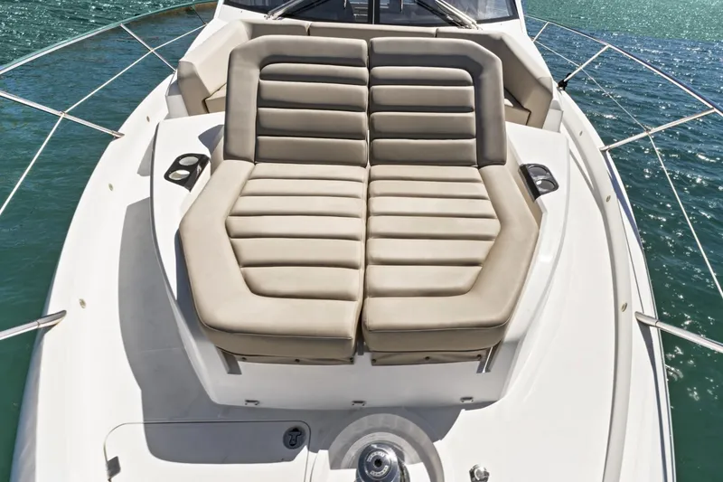 Slide: The Image of Luxurious 2019 Sunseeker Manhattan 66 yacht with plush sunbed on deck. - 13