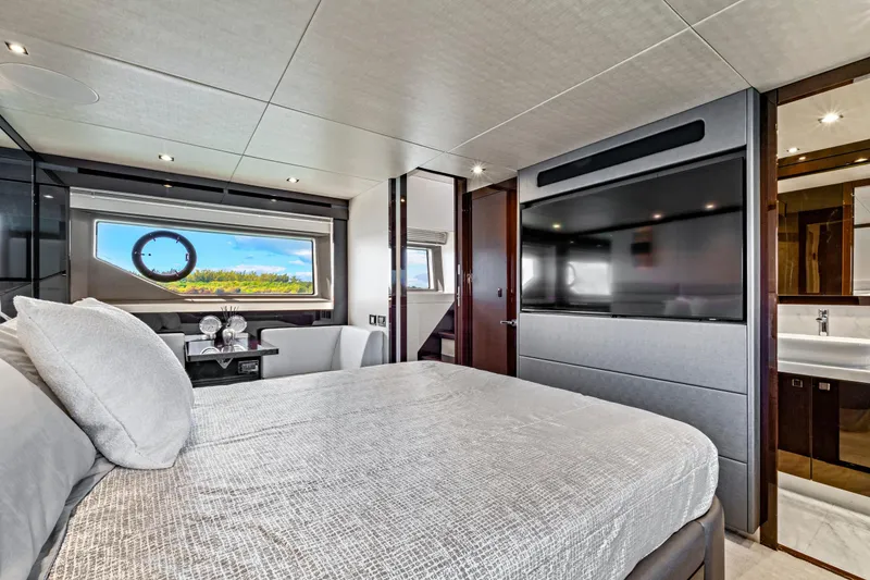 Slide: The Image of Luxurious bedroom interior of 2019 Sunseeker Manhattan 66 yacht with modern amenities. - 38