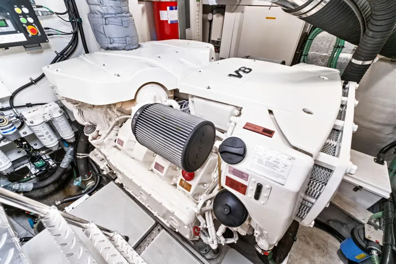 Slide: The Image of Engine room of 2019 Sunseeker Manhattan 66 yacht, featuring a powerful V8 engine. - 47