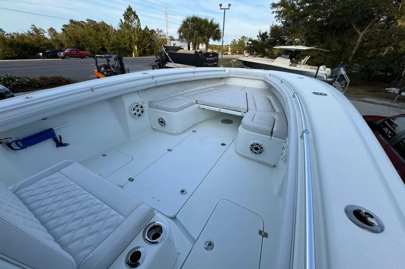 Slide: The Image of 2019 Yellowfin 34 Offshore boat with spacious seating and sleek design. - 17