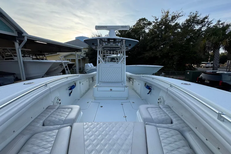 Slide: The Image of 2019 Yellowfin 34 Offshore boat with spacious seating and modern design. - 22