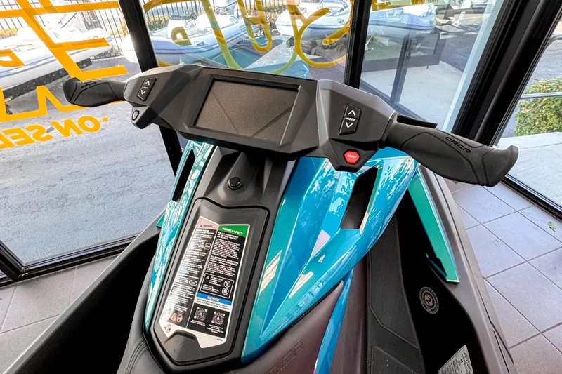 Slide: The Image of 2025 Taiga Orca P2 jet ski dashboard in a showroom. - 5