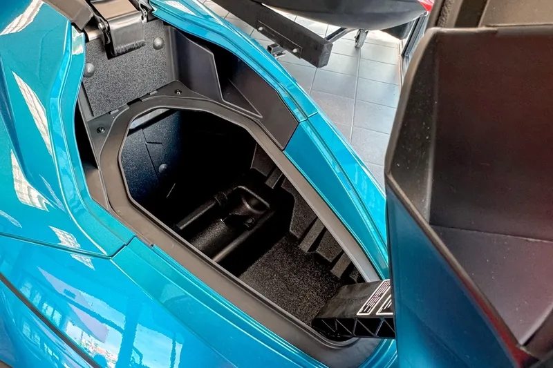 Slide: The Image of Interior of Taiga Orca P2 2025, blue storage compartment. - 8