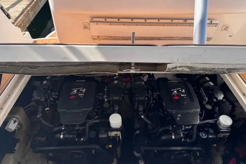 Slide: The Image of Engine compartment of a 2005 Sea Ray 280 Sundancer with twin MerCruiser 4.3 MPI engines. - 26