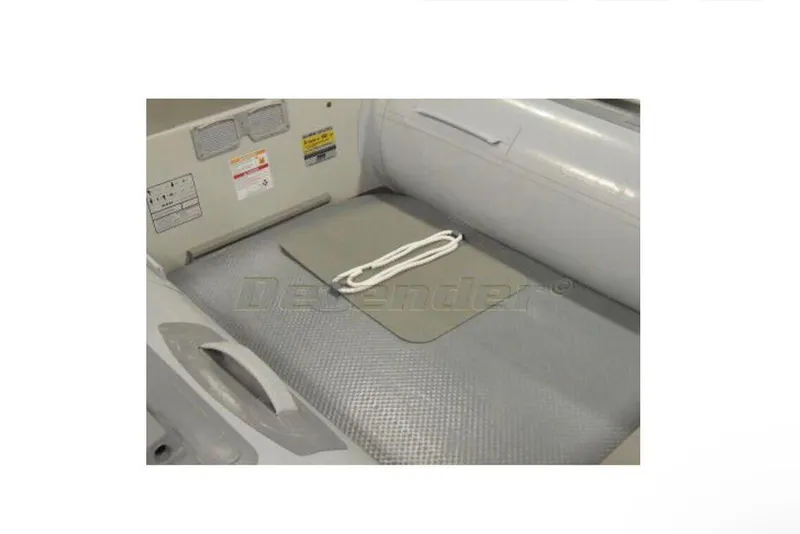 Slide: The Image of Interior of 2025 Achilles LSI-310E inflatable boat with rope and textured floor. - 3