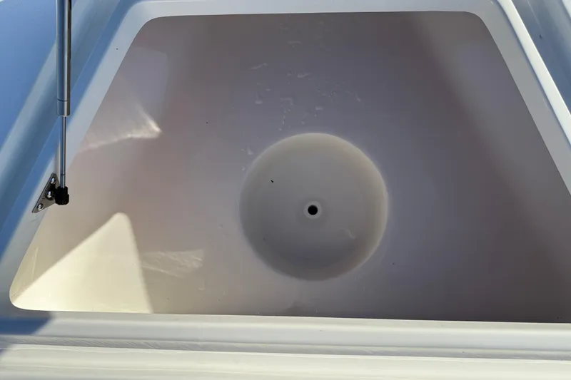 Slide: The Image of Open storage compartment on 2026 Key West 210 Bay Reef boat. - 32