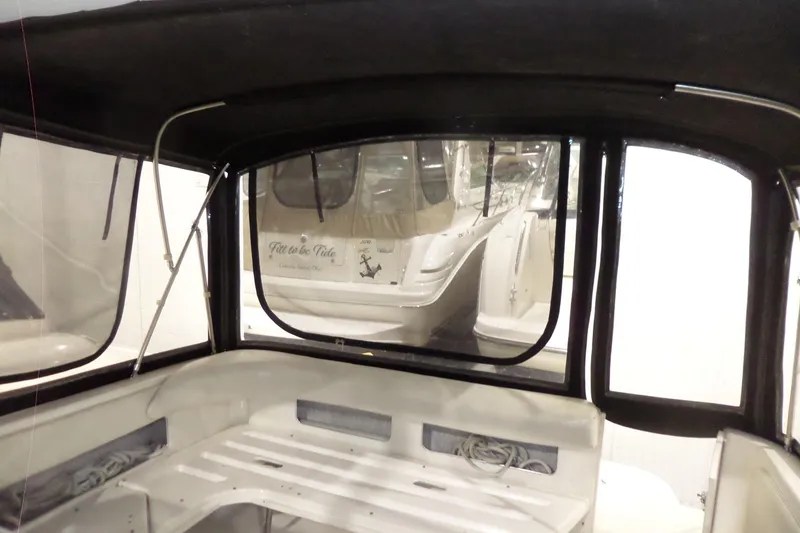 Slide: The Image of 1994 Searay 300 Weekender boat interior with rear view of another vessel. - 41