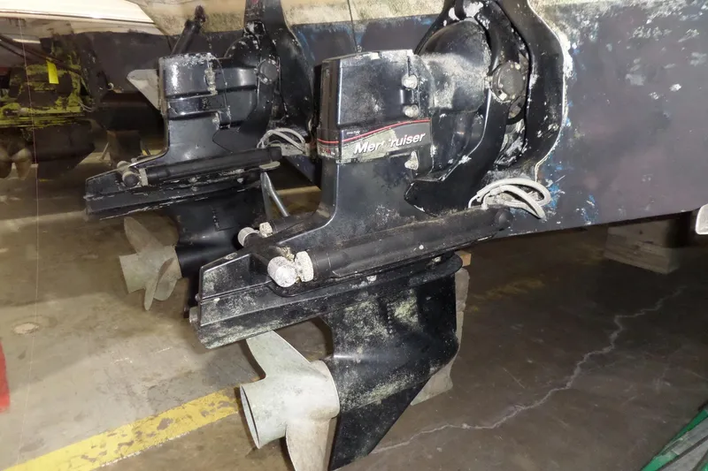 Slide: The Image of 1994 Searay 300 Weekender boat with MerCruiser outdrive in a garage. - 44