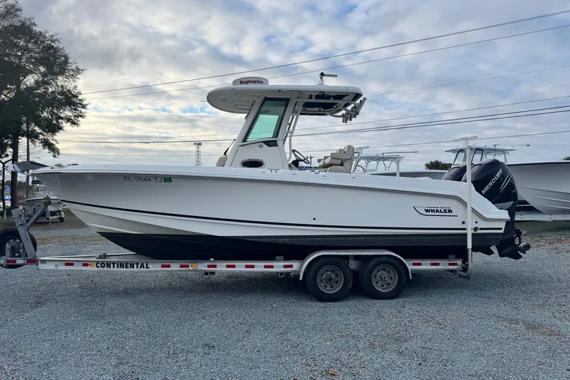The Image of 2018 Boston Whaler 250 Outrage boat on trailer, side view, outdoors. - 1