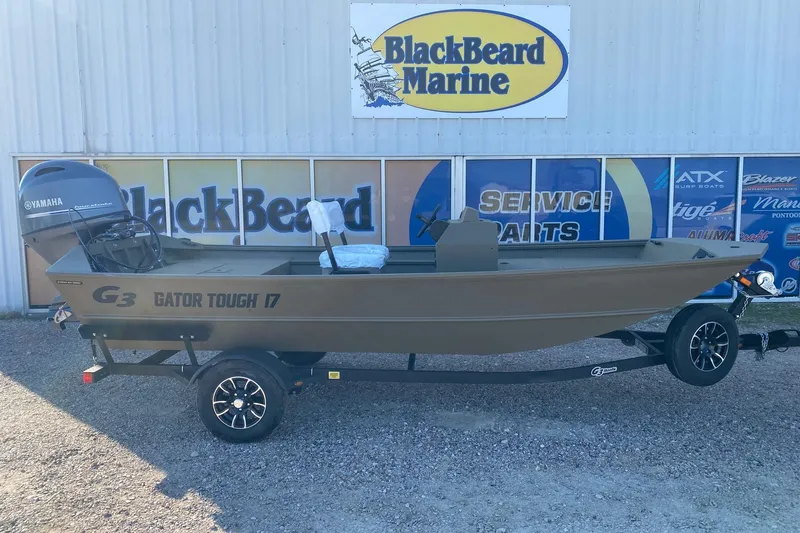 The Image of 2026 G3 Gator Tough 17 CCJ boat on trailer at BlackBeard Marine dealership. - 1