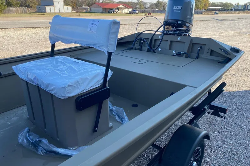 Slide: The Image of 2026 G3 Gator Tough 17 CCJ boat with Yamaha engine, on trailer, in outdoor setting. - 10