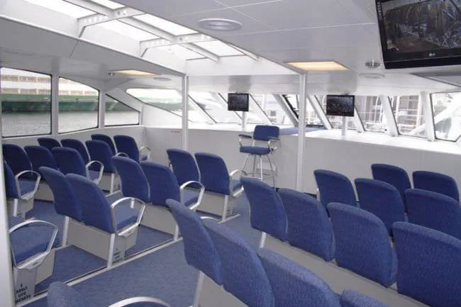 Slide: The Image of Interior of 2008 Custom High Speed 70pax COI Passenger vessel with blue seating. - 12