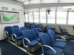 Slide: The Image of Interior of 2008 Custom High Speed 70pax COI Passenger vessel with blue seating. - 14