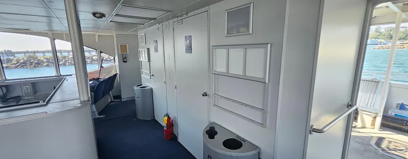 Slide: The Image of Interior of a 2008 Custom High Speed 70pax COI Passenger vessel, featuring modern amenities. - 27