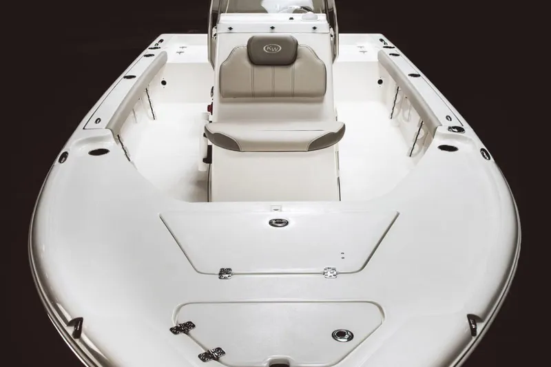 Slide: The Image of 2026 Key West 188 Bay Reef boat with Suzuki engine on trailer, outdoors. - 3