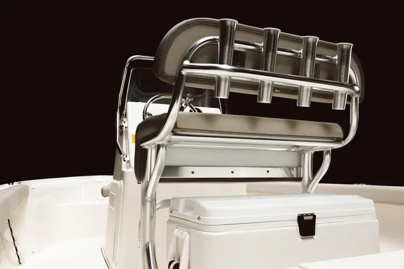 Slide: The Image of 2026 Key West 188 Bay Reef boat with canopy, parked near dealership. - 6