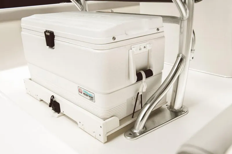 Slide: The Image of 2026 Key West 188 Bay Reef boat deck, featuring storage compartments and seating. - 7