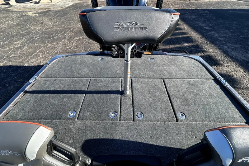 Slide: The Image of 2026 Skeeter ZXE21 boat deck with seating and storage compartments. - 28