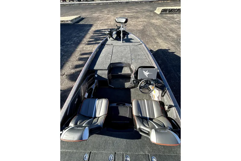 Slide: The Image of 2026 Skeeter ZXE21 boat interior with dual seats and steering console. - 37