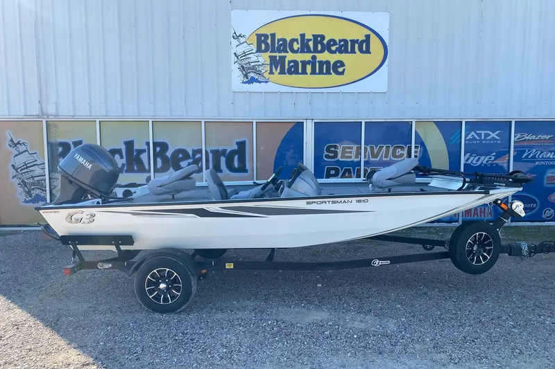 The Image of 2026 G3 Sportsman 1610 boat at BlackBeard Marine dealership, featuring Yamaha engine. - 1