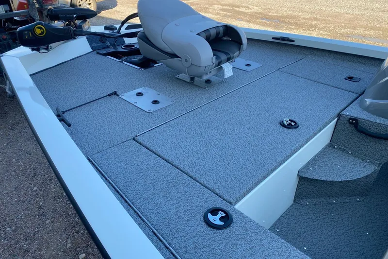 Slide: The Image of 2026 G3 Sportsman 1610 boat interior with seating and storage compartments. - 10