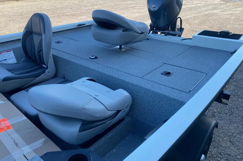 Slide: The Image of 2026 G3 Sportsman 1610 boat interior with seating and storage compartments. - 11