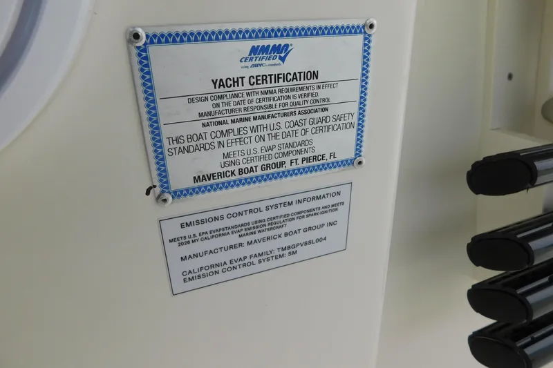 Slide: The Image of Yacht certification plaque on 2026 Cobia 265 Center Console, detailing compliance and emissions standards. - 39