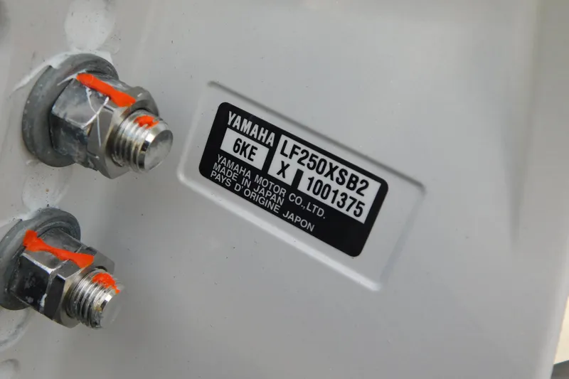 Slide: The Image of Close-up of Yamaha motor label on 2026 Cobia 265 Center Console boat. - 49