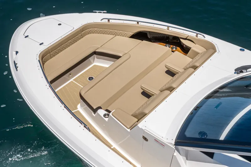 Slide: The Image of 2023 Sea Ray Sundancer 370 OB boat with luxurious seating on deck. - 13