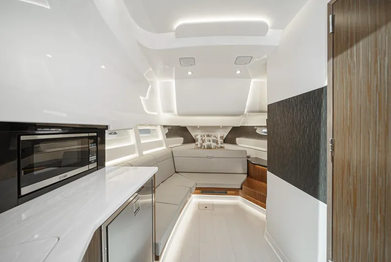 Slide: The Image of Luxurious interior of 2023 Sea Ray Sundancer 370 OB yacht with modern amenities and sleek design. - 27