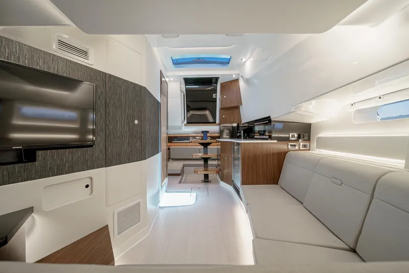 Slide: The Image of Luxurious interior of 2023 Sea Ray Sundancer 370 OB yacht with modern amenities and sleek design. - 31