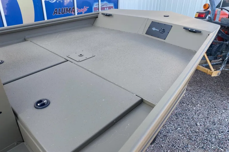 Slide: The Image of 2026 G3 Gator Tough 18 CCJ boat deck, featuring storage compartments and durable design. - 9