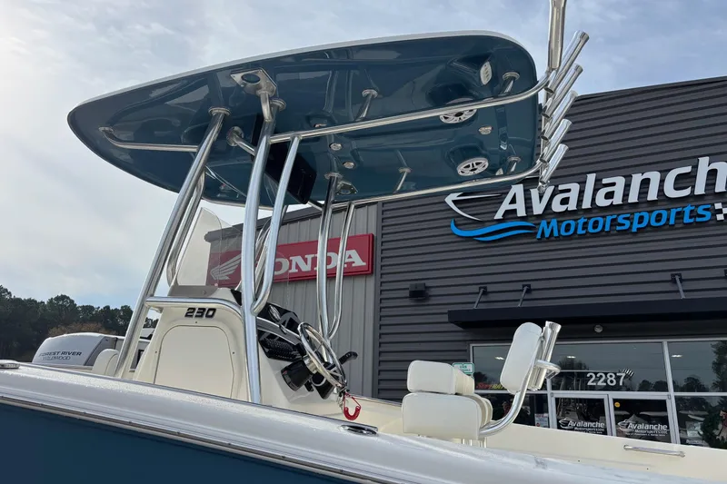 Slide: The Image of 2026 Bulls Bay 230 Center Console boat at Avalanche Motorsports dealership. - 2