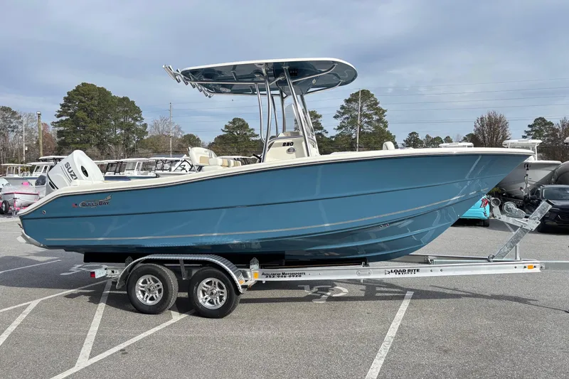 Slide: The Image of 2026 Bulls Bay 230 Center Console boat on trailer in parking lot. - 5