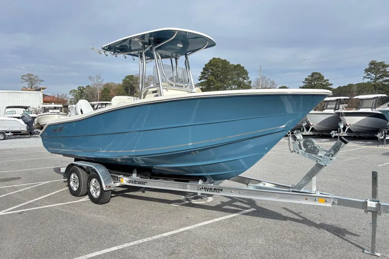 Slide: The Image of 2026 Bulls Bay 230 Center Console boat on trailer in parking lot. - 6