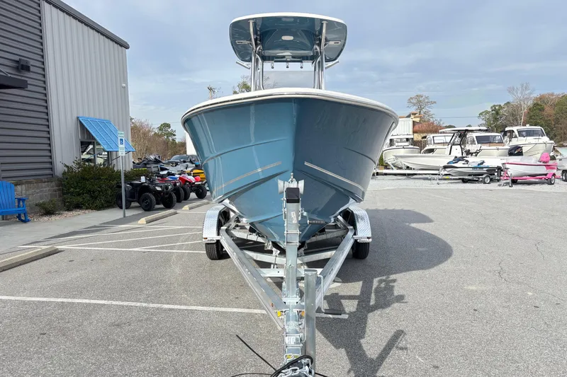 Slide: The Image of 2026 Bulls Bay 230 Center Console boat on trailer in parking lot. - 7