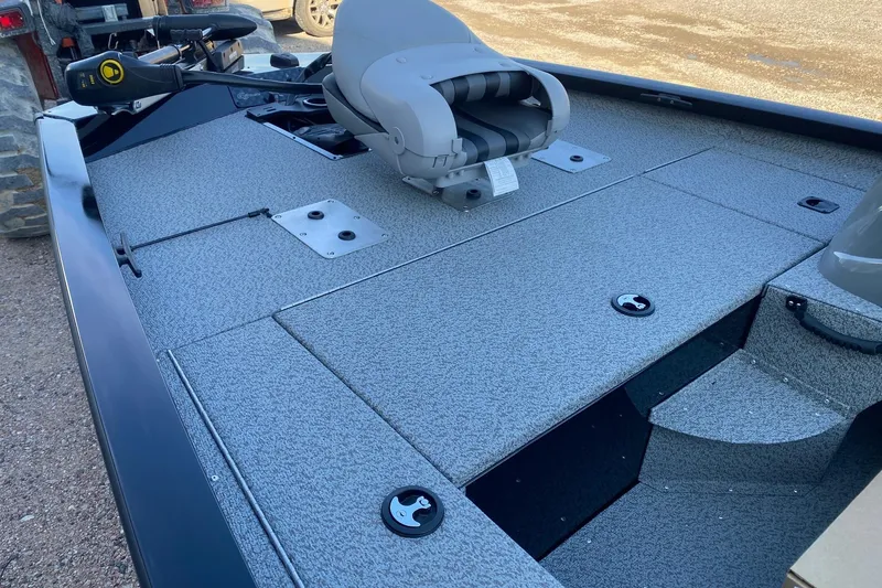 Slide: The Image of 2026 G3 Sportsman 1610 boat interior with seating and storage compartments. - 11