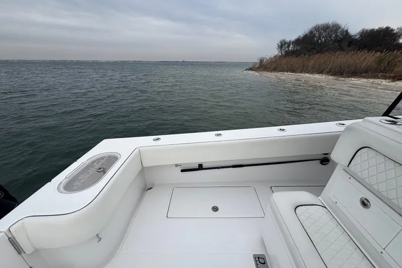 Slide: The Image of 2016 Sea Hunter 35 Tournament boat interior with ocean view and shoreline. - 25