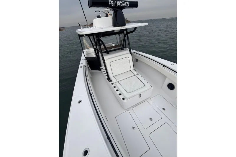 Slide: The Image of 2016 Sea Hunter 35 Tournament boat with spacious deck and seating on calm water. - 34