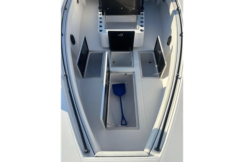 Slide: The Image of 2016 Sea Hunter 35 Tournament boat interior with open storage compartments. - 37
