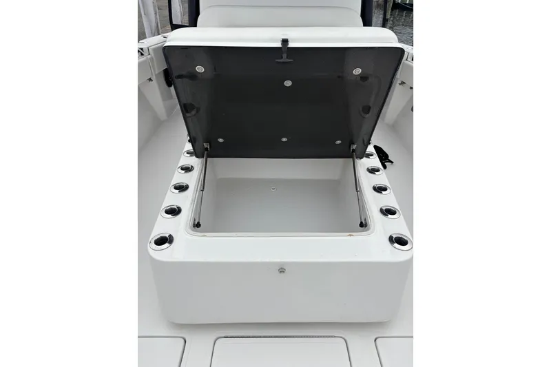 Slide: The Image of Open storage compartment on 2016 Sea Hunter 35 Tournament boat. - 42