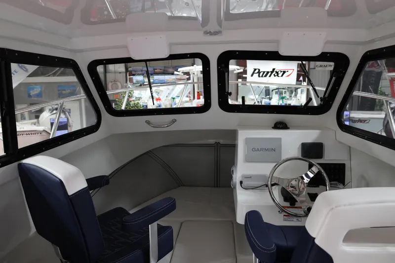 Slide: The Image of Interior of 2026 Parker 227 Explorer boat with Garmin navigation system. - 13
