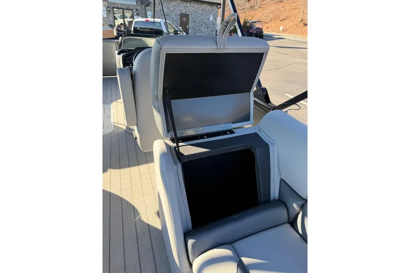 Slide: The Image of 2026 Bentley Pontoons Legacy 223 Navigator interior storage compartment open. - 9
