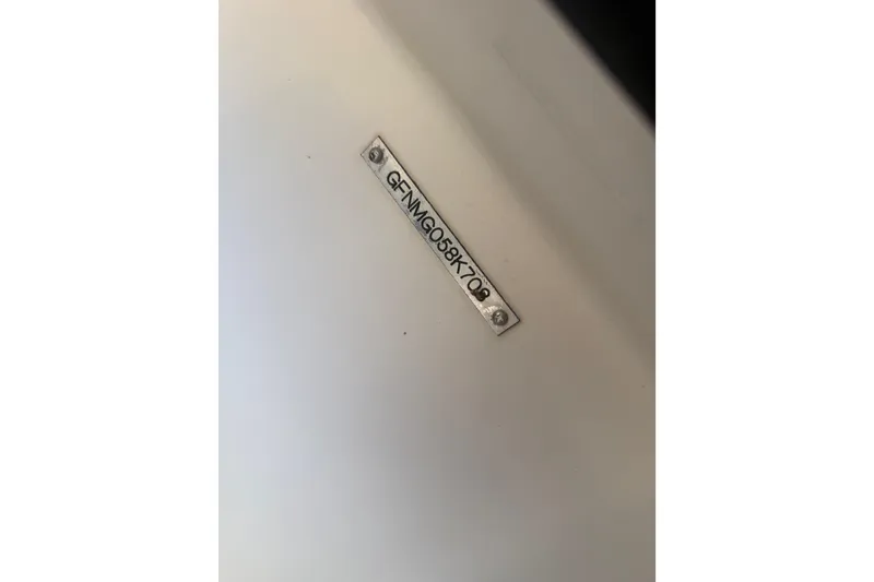 Slide: The Image of 2008 Four Winns 203 Horizon Fish & Ski boat identification plate. - 12