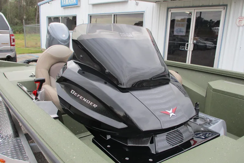 Slide: The Image of 2026 Vexus DEFENDER AVX181 boat with sleek black design and comfortable seating. - 12