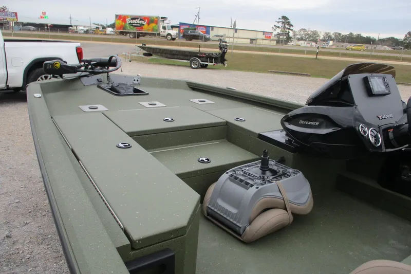 Slide: The Image of 2026 Vexus DEFENDER AVX181 boat interior with control panel and seating. - 18