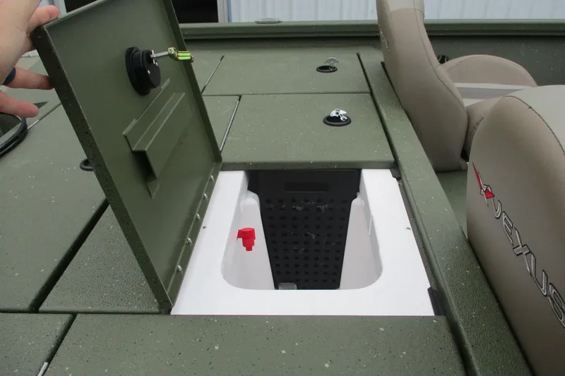 Slide: The Image of 2026 Vexus DEFENDER AVX181 boat interior with open storage compartment and seating. - 8