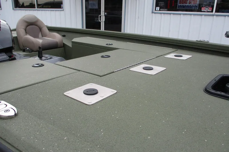 Slide: The Image of 2026 Vexus DEFENDER AVX181 boat deck with storage compartments and seating. - 14